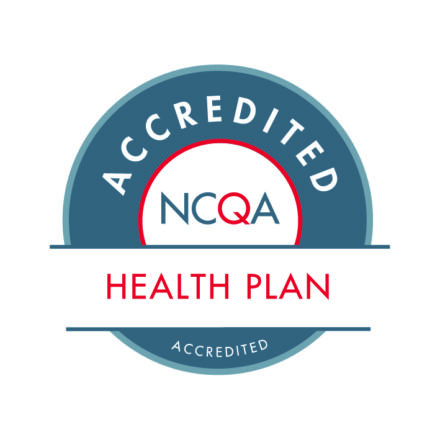 A circular blue and white badge with Accredited NCQA Health Plan written in red and white text. The word Accredited appears at the top and bottom of the circular border.